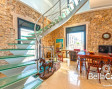 Maison en pierre naturelle sur 3 niveaux avec ascenseur, studio et cave voûtée d' origine
